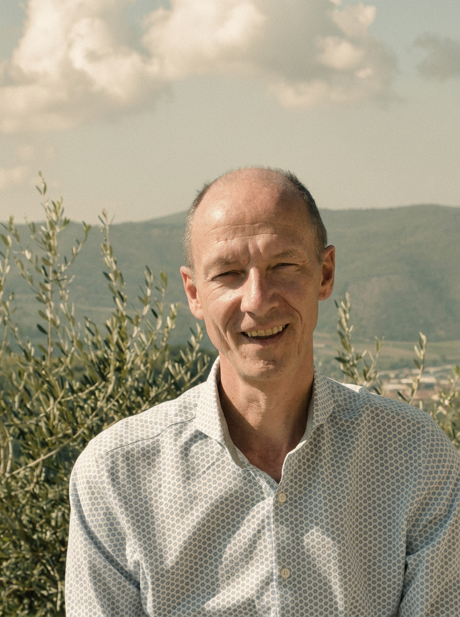 Jacques Vandewal, founder of Olivalore, among olive trees in Tuscany